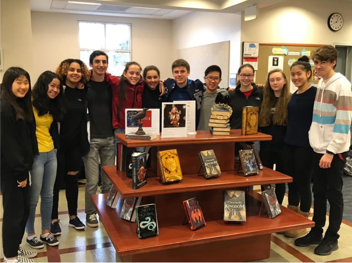 Members of Library Advisory Council Next To Bardugo Display
