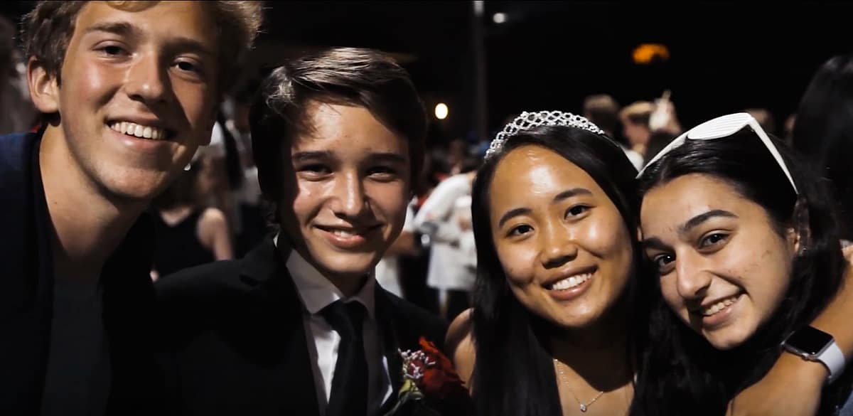 Homecoming Court members Patrick Hastings '20 and Irene Jang '20 pose for the camera along with Jeffrey Pendo '20 and Carina Mankerian '20.