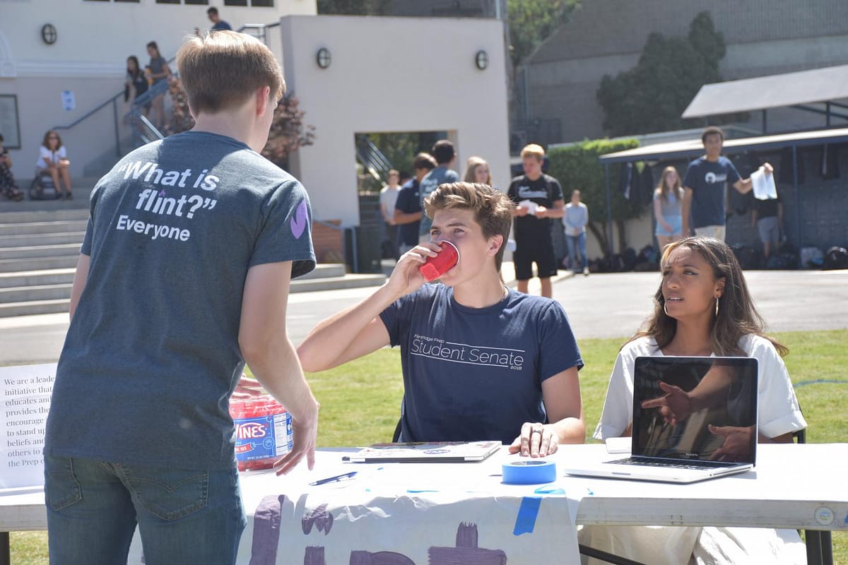 Spencer Harris '19, Luke Stiles '19, and Jasmine Samuels '20 showcase FLINT at Club Rush.