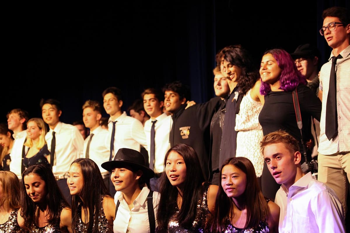 JPD performers gather to sing Piano man at the end of the show.