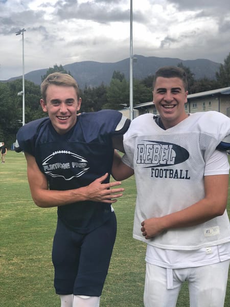 Ben Grable '20 and Ben Sacks '19 smile for a picture before practice.