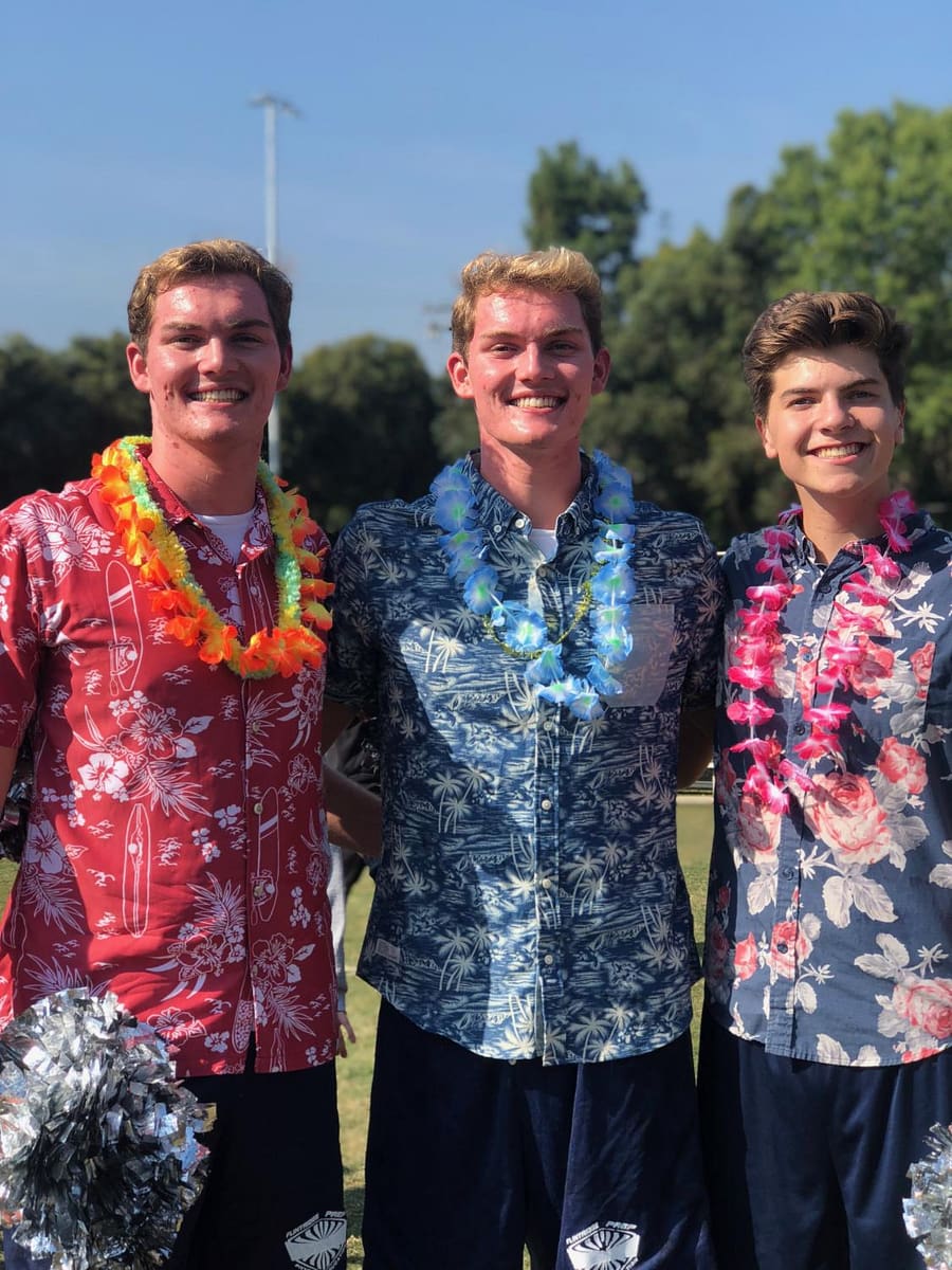 Oliver Brookbanks '19, Ben Brookbanks '19, and Luke Stiles '19 enjoying the Hawaiian dress-up day.